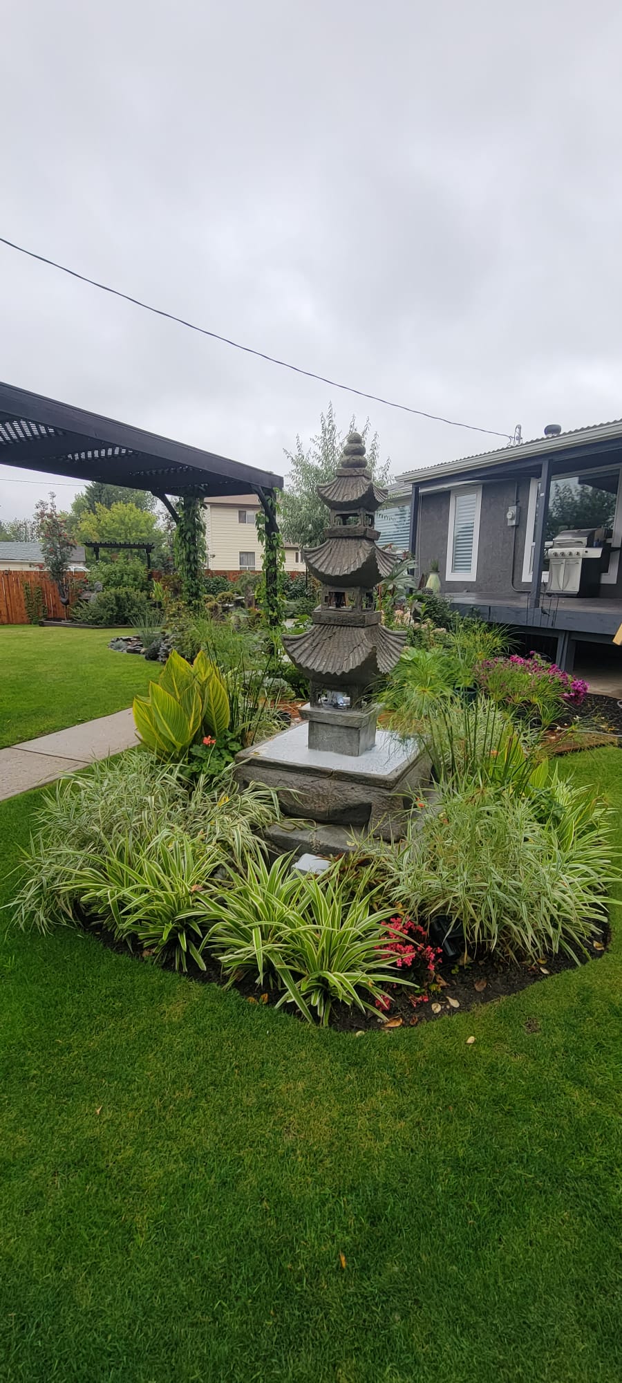 Backyard focal garden concept by Interiors on Main