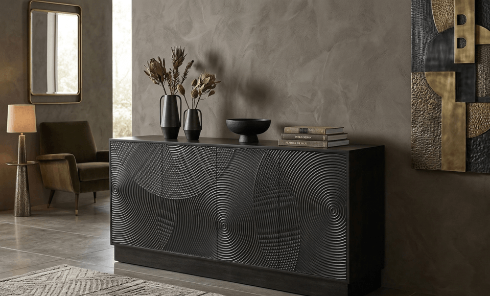 Dark sculpted sideboard with textured doors