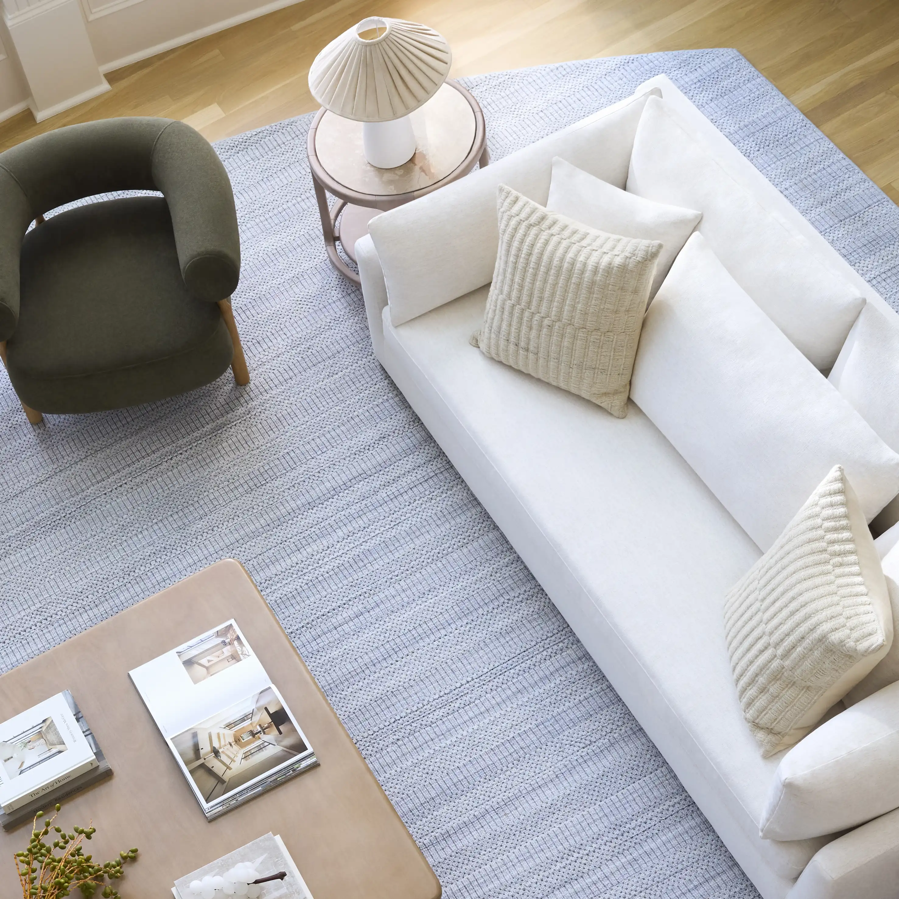 Light woven rug beneath a bright seating arrangement